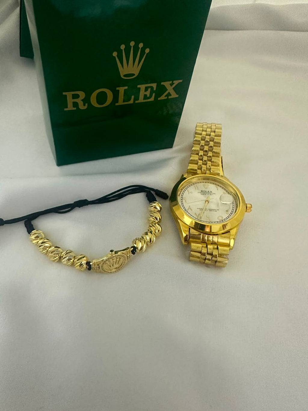 Reloj Rolex + Pulseras Rolex Balin.