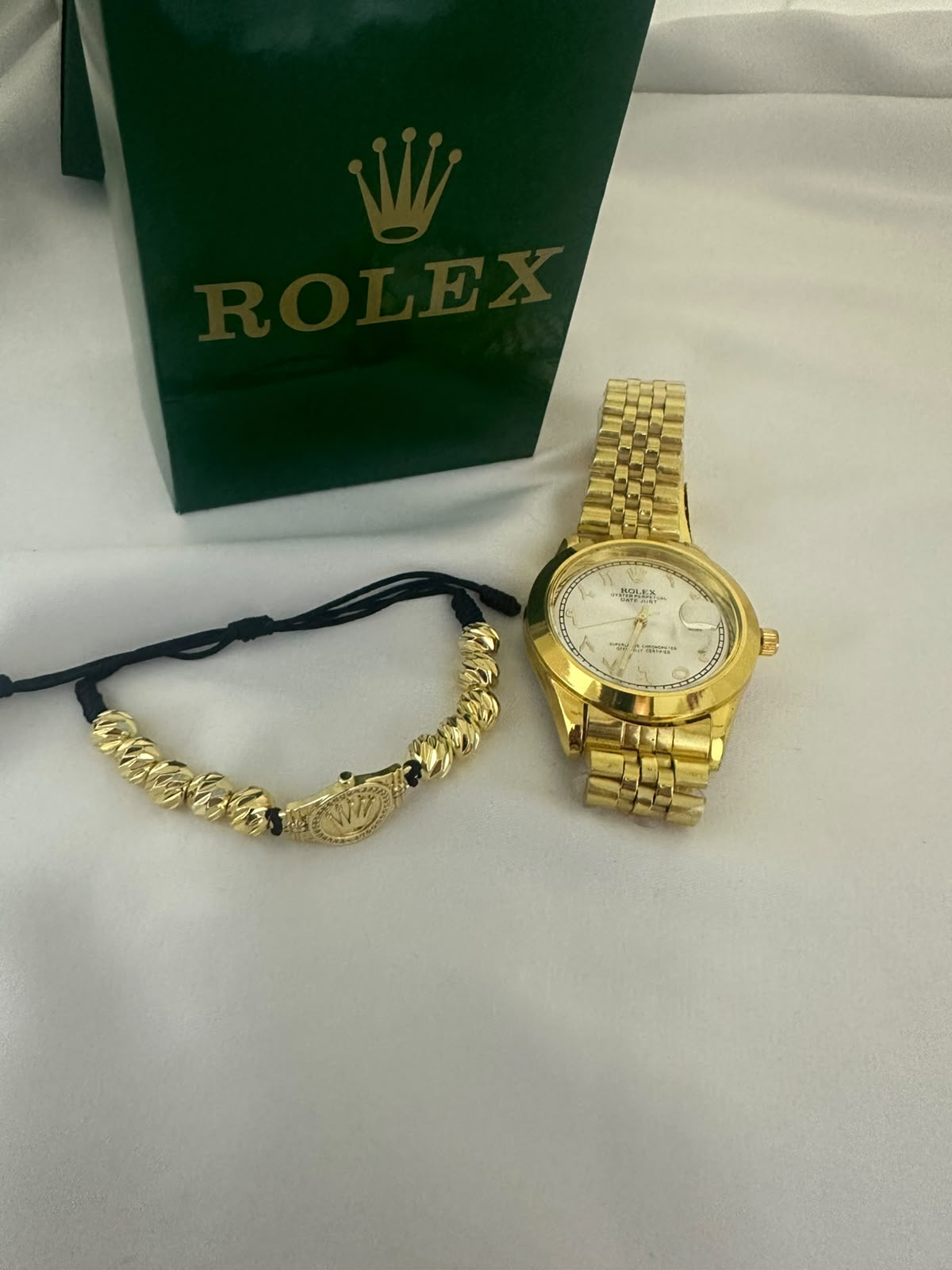 Reloj Rolex + Pulseras Rolex Balin.